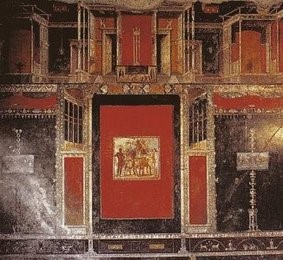 Fresco on a wall in the fourth style: red, black and white colors are used to depict rigid architecture.  