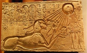 Akhenaten depicted as a sphinx at Amarna, solar rays bathing him.