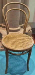 Chair 14 (1859) with light wood lattice seat and light wood legs and back. 
