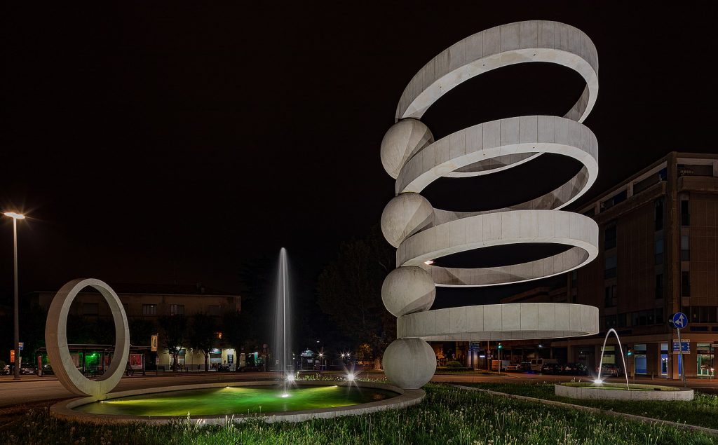 Fontana di Carmelata: A large, spiral piece of art that appears to be outside in a square. 