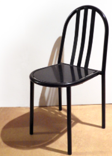 Chair (1929-1931) by Mallet-Stevens: A black, simple chair with three posts along the back.