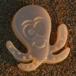 Plastic octopus thrown back by the Pacific Ocean
