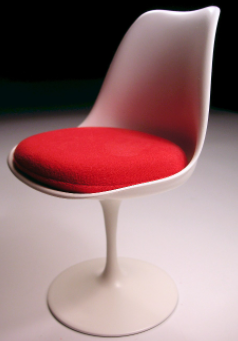 Tulip Chair: In 1956, Knoll introduced Eero Saarinen's tulip chairs and pedestal.