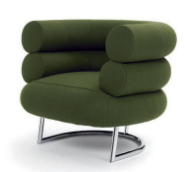 Bibendum chair by gray: A green, fluffy structure with skinny metal legs. 
