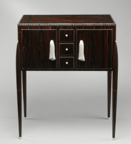 Fuseaux Cabinet: A dark wood cabinet with four skinny legs. 