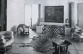 Le salon de verre (Glass Salon) 
diseñado por Paul Ruaud con muebles de Eileen Gray.