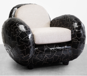 Maarten Baas expone la colección de caparazón en Carpenters Workshop Gallery- un sillón bulboso.