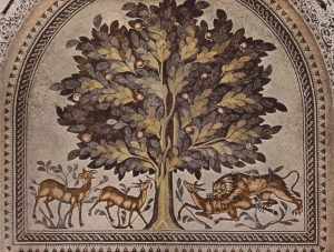 Audience Room Mosaic: A tree mosaic with 3 faun-like creatures, one of which is attacked by a lion. 