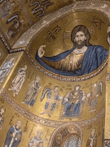 Close-up of the mosaic series in the sanctuary with Christ Pantocrator and saints painted on the dome ceiling of the structure. 

