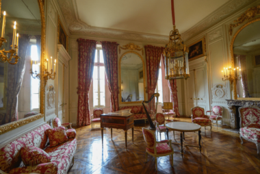 Salon de Compagnie: A large decorated room in the style of Louis XVI.