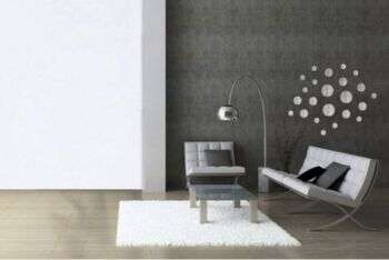 Plage Colección: A minimalist living room example with grey-toned furniture.