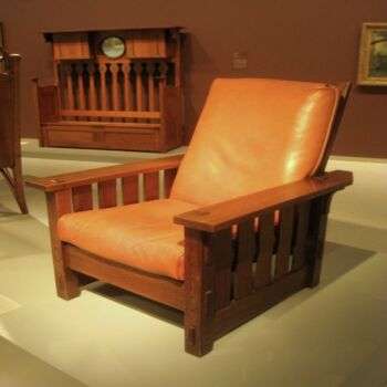 Adjustable-Back Chair No. 2342 (1900): photo of a comfy-looking chair with large arms and a orange leather cushion.