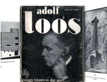 Adolf Loos poster: A photo in black and white of an Adolf Loos poster of a man looking off to the side. 