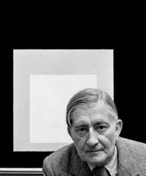Albers in front of one of his Homage to the Square paintings.