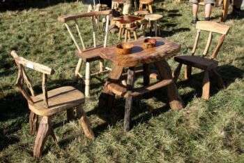 25th Ickworth Wood & Craft Fair 2014: A photo of a dinning room table set with three chairs and one table. 