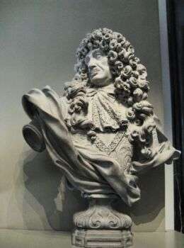 A white stone bust of Charles II.