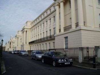 Cumberland Terrace: A large, light-colored building with columns holding up the edges of the building. 