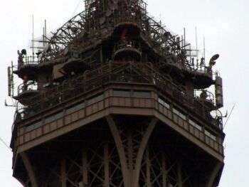 Photo of the top of the Eiffel Tower. 