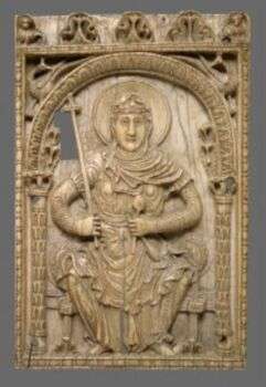 Plaque with the Virgin Mary as a Personification of the Church. A tan stone plaque with a woman sitting under an arch. 