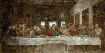 Leonardo's depiction of the Last Supper: Jesus at the center with his disciples surrounding him on either side. They are all seen seated at a long, skinny table. 