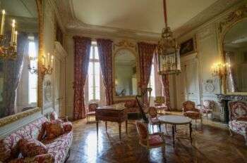 Salon de Compagnie: A large decorated room in the style of Louis XVI.