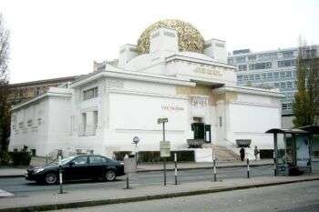 The Secession Building, 1897-1898, J. M. Olbrich: A large white building with a golden dome on the roof. 