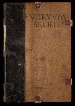 Una foto del De Architectura, un libro antico con una copertina a due toni.
