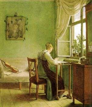 A painting of a girl embroidering at a table in front of an open window. The whole piece has a green cast to it. 