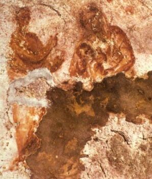 Photo of the remains of a fresco of Mother Mary nursing Jesus, found in the Catacomb of Priscilla, in Rome.  
